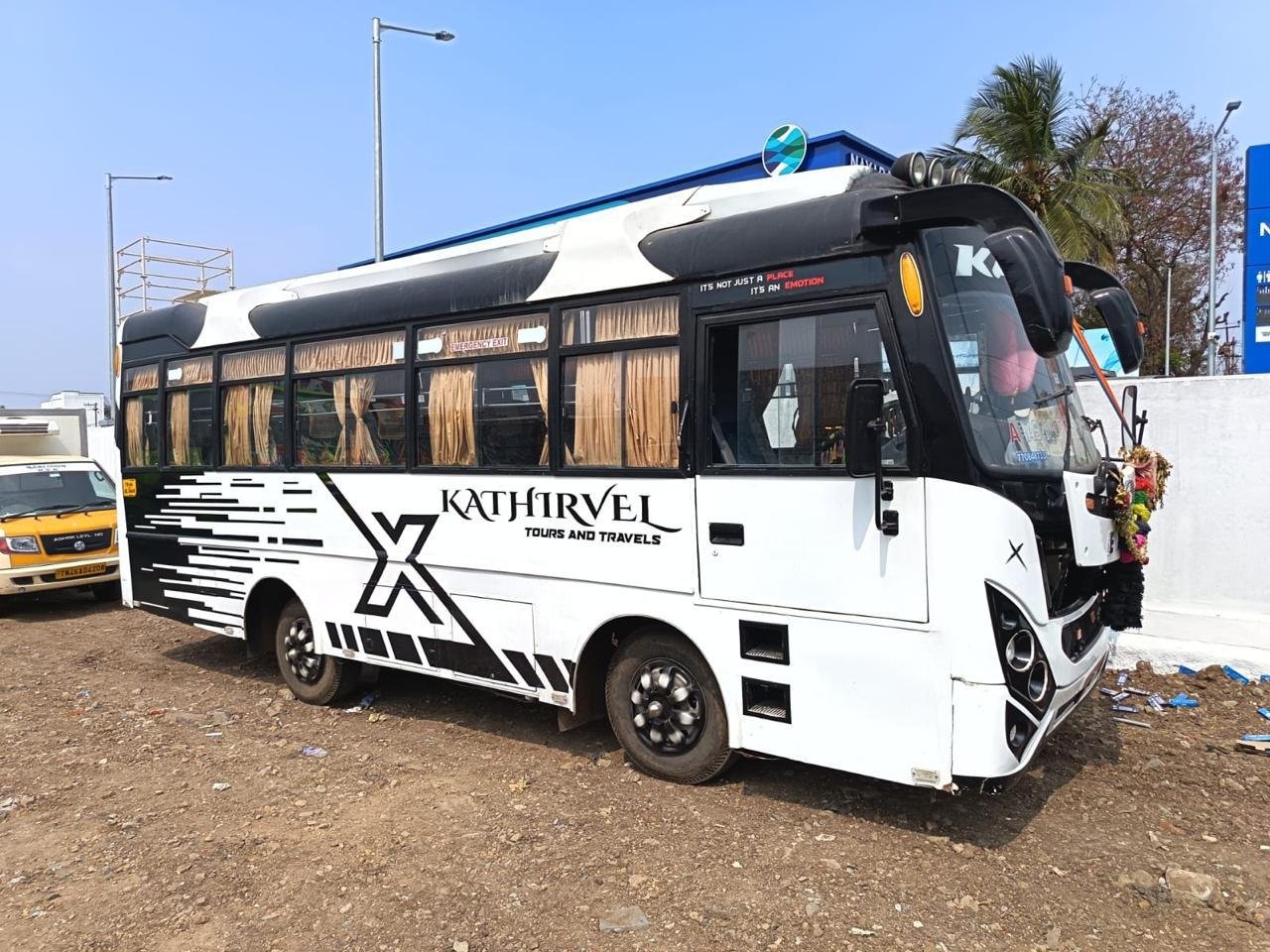 Kathir Tours and Travels coach, front side view
